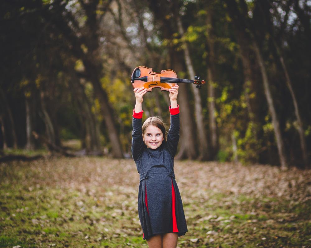 Escuela de música con enfoque Suzuki - niños aprendiendo violín clásica